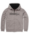 Stay warm this season with this trendy sherpa lined hoodie by Quiksilver.