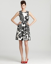 An elegant paisley print meets a bold black-and-white palette for retro glamour infused with modern edge. Finish the kate spade new york dress with a slash of lipstick and color-pop heels for a party-ready style. An elegant paisley print meets a bold black-and-white palette for retro glamour infused with modern edge. Finish the kate spade new york dress with a slash of lipstick and color-pop heels for a party-ready style.