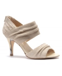 Make a grand entrance in Isola's exotic snake print Demi open-toe sandals. Featuring a painted heel and a peep-toe for a stunning finish. Make a grand entrance in Isola's exotic snake print Demi open-toe sandals. Featuring a painted heel and a peep-toe for a stunning finish.