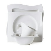Add a New Wave of vibrance to your table setting with this innovative dinnerware collection. Distinguished by angular shapes in fluid wave designs, pieces work together creating a host of options for imaginative presentation. Microwave and dishwasher safe. Add a New Wave of vibrance to your table setting with this innovative dinnerware collection. Distinguished by angular shapes in fluid wave designs, pieces work together creating a host of options for imaginative presentation. Microwave and dishwasher safe.