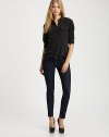 Five-pocket stretch cotton denim style has J Brand's slimmest leg.THE FITFlat front 10 leg opening Graded rise, about 7½ Inseam, about 29THE DETAILSButton and zip fly Belt loops Rivet detail Plain back pockets Cotton/spandex; machine wash Made in USA