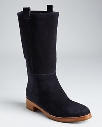 Pull on riding boots with Western and classic chukka influences in supple suede; by Via Spiga.