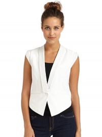THE LOOKRhinestone-embellished lapelsOne-button frontSleeveless with gathered knit panelsSingle chest welt pocketDual front besom pocketsFront cutaway hemCurved back hemTHE FITAbout 20 from shoulder to longest point of hemTHE MATERIAL65% rayon/30% nylon/5% spandexContrast: 95% rayon/5% spandexFully linedCARE & ORIGINDry cleanImportedModel shown is 5'8 (172½cm) wearing US size Small. THE LOOKRhinestone-embellished lapelsOne-button frontSleeveless with gathered knit panelsSingle chest welt pocketDual front besom pocketsFront cutaway hemCurved back hemTHE FITAbout 20 from shoulder to longest point of hemTHE MATERIAL65% rayon/30% nylon/5% spandexContrast: 95% rayon/5% spandexFully linedCARE & ORIGINDry cleanImportedModel shown is 5'8 (172½cm) wearing US size Small.