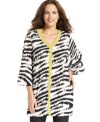 Electrify your leggings with Alfani's three-quarter sleeve plus size top, featuring a striking print!