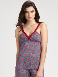 An intricate floral print in rich crimson hues transforms this plunging v-neck design. V-neckSleevelessSolid trim at necklineGathered ruchingViscose/elastaneHand washMade in Italy An intricate floral print in rich crimson hues transforms this plunging v-neck design. V-neckSleevelessSolid trim at necklineGathered ruchingViscose/elastaneHand washMade in Italy
