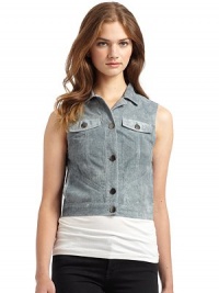 THE LOOKShirt collarButton-down placketSleevelessFlap front pocketsSlash side pocketsBack cutoutsTHE FITAbout 18 from shoulder to hemCroppedTHE MATERIALLeather; cotton liningCARE & ORIGINDry clean by a leather specialistImportedOUR FIT MODEL RECOMMENDS ordering one size up as this style runs small. THE LOOKShirt collarButton-down placketSleevelessFlap front pocketsSlash side pocketsBack cutoutsTHE FITAbout 18 from shoulder to hemCroppedTHE MATERIALLeather; cotton liningCARE & ORIGINDry clean by a leather specialistImportedOUR FIT MODEL RECOMMENDS ordering one size up as this style runs small.