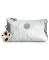 This petite take-anywhere pouch from Kipling slips discretely into a handbag and easily stows cash, cards, coins and ID. Center zipper pocket and side compartments keep you organized on-the-go, while the adorable money keychain is a great conversation starter. This petite take-anywhere pouch from Kipling slips discretely into a handbag and easily stows cash, cards, coins and ID. Center zipper pocket and side compartments keep you organized on-the-go, while the adorable money keychain is a great conversation starter.