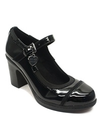 KORS Michael Kors updates the classic Mary Jane, rendering the Baylin in patent leather, with a chunky high heel and tonal logo charm at the buckle. KORS Michael Kors updates the classic Mary Jane, rendering the Baylin in patent leather, with a chunky high heel and tonal logo charm at the buckle.