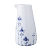 Showcasing a hand-painted blue-on-white floral pattern that's embellished with bold geometric motifs, Royal Copenhagen's Blue Elements pitcher artfully embodies traditional style with a nod towards modernity.