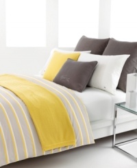 Morning sunshine. Inspired by purity and simplicity, the Dellen comforter set from Lacoste awakens your room with crisp stripes of citron and gray in soft cotton. Reverses to self.