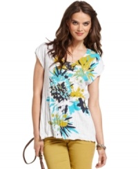 A basic tee is reborn in this DKNY Jeans look, featuring an exploded floral graphic print at the front and allover crinkled fabric. It pairs perfectly with colored jeans and bold accessories! A basic tee is reborn in this DKNY Jeans look, featuring an exploded floral graphic print at the front and allover crinkled fabric. It pairs perfectly with colored jeans and bold accessories!