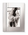 Charming and understated, kate spade silver-plated Library Stripe frames are etched with clean vertical stripes of varying widths that work equally well in salon or boudoir.