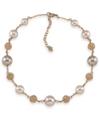Elegance at its best. Carolee's beautiful illusion necklace combines glass pearls and crystal fireballs in 12k gold-plated mixed metal. Approximate length: 16 inches + 2-inch extender. Elegance at its best. Carolee's beautiful illusion necklace combines glass pearls and crystal fireballs in 12k gold-plated mixed metal. Approximate length: 16 inches + 2-inch extender.