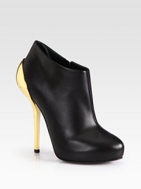 Luminous goldtone metal heel adds polished style to this ultra-high leather silhouette. Metal heel, 5¼ (130mm)Hidden platform, ¾ (20mm)Compares to a 4½ heel (115mm)Leather upperSide zipLeather lining and solePadded insoleMade in Italy Luminous goldtone metal heel adds polished style to this ultra-high leather silhouette. Metal heel, 5¼ (130mm)Hidden platform, ¾ (20mm)Compares to a 4½ heel (115mm)Leather upperSide zipLeather lining and solePadded insoleMade in Italy