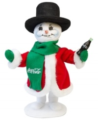 A thirsty snowman pops open a different type of holiday bubbly in this essential figurine for Coca-Cola collectors. Crafted with the soft, flexible features and unmistakable style of Annalee. A thirsty snowman pops open a different type of holiday bubbly in this essential figurine for Coca-Cola collectors. Crafted with the soft, flexible features and unmistakable style of Annalee.