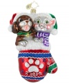 Bring a cat or dog in from the cold this season with the Pause for Paws charity ornament, handcrafted by Christopher Radko. These furry friends are just two of the animals eager to warm your home.