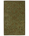 Make your home your sanctuary with this Utopia rug from Sphinx. Soft blue and chocolate hues bring life to an elegantly scrolled motif, enhancing your decor with simple, classic beauty. With an ultrasoft, lustrous finish for a blissful result.