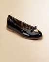 Shiny patent leather flats are adorned with a bow and logo-engraved heart at the vamp.Slip-onLeather upperLeather liningRubber solePadded insoleImported