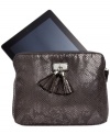 Treat your favorite tech toy to something wild with this sleek, snakeskin-embossed iPad sleeve from Nine West. Slim and chic with flirty tassels and extra interior padding, it slips easily into a tote or can be carried like a clutch.