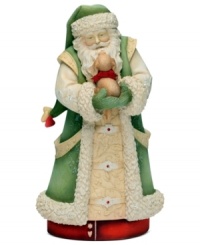 Every child's perfect Christmas present, Santa's ready to deliver a furry friend with a red bow around his neck in this precious figurine. Santa is dressed in a traditional robe and hat with crystal embellishments. Every child's perfect Christmas present, Santa's ready to deliver a furry friend with a red bow around his neck in this precious figurine. Santa is dressed in a traditional robe and hat with crystal embellishments.