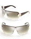 Show off your stunningly chic style in Gucci's shield sunglasses, featuring crystal bridal accents and gradient lenses.