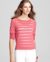 Sheer stripes parade across an effortless Eileen Fisher top for spirited approach to everyday style.