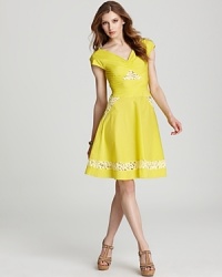 This ladylike Z Spoke by Zac Posen dress is given an alluring modern upgrade in a bold highlighter hue and strategic cutouts flourished with rich lace. This ladylike Z Spoke by Zac Posen dress is given an alluring modern upgrade in a bold highlighter hue and strategic cutouts flourished with rich lace.