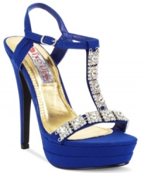 Sparkle and shine all night long. Two Lips' Chandelier sandals feature chunky rhinestone embellishments all along the T-strap and a wrap-around ankle strap with side buckle. Sparkle and shine all night long. Two Lips' Chandelier sandals feature chunky rhinestone embellishments all along the T-strap and a wrap-around ankle strap with side buckle.