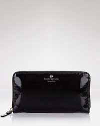 A simply chic continental wallet in glossy patent leather from kate spade new york. A simply chic continental wallet in glossy patent leather from kate spade new york.