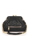 Marc Jacobs toughens up this ladylike silhouette with luxe leather in this mini version of the iconic Stam bag.