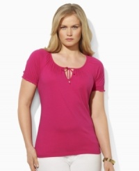 This short-sleeved plus size Lauren by Ralph Lauren top is designed in light-as-air tissue cotton with smocked cuffs and a chic keyhole at the front. This short-sleeved plus size Lauren by Ralph Lauren top is designed in light-as-air tissue cotton with smocked cuffs and a chic keyhole at the front.