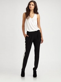 Tailored silk pants updated with this season's must-have detail, the classic tuxedo stripe.High waistBack button tabsPleated frontSlash pocketsBack welt pocketsInseam, about 10Rise, about 31SilkDry cleanImportedModel shown is 5'10 (177cm) wearing US size 4. Tailored silk pants updated with this season's must-have detail, the classic tuxedo stripe.High waistBack button tabsPleated frontSlash pocketsBack welt pocketsInseam, about 10Rise, about 31SilkDry cleanImportedModel shown is 5'10 (177cm) wearing US size 4.