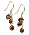 Go for a subtle hint of color. These beautiful earrings feature bronze-colored cultured freshwater pearls (6-7 mm) set in 18k gold over sterling silver. Approximate drop: 1-1/4 inches.