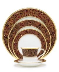 Add drama to your tabletop with this bold pattern from Noritake! Strikingly elegant, this bone china features a rich gold and red brocade border adorned with soft ivory dots and a gold band. Add drama to your tabletop with this bold pattern from Noritake! Strikingly elegant, this bone china features a rich gold and red brocade border adorned with soft ivory dots and a gold band.