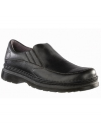 Textured leather and contrast stitching add vintage charm to these rugged slip-on men's casual shoes from Dr. Martens. Textured leather and contrast stitching add vintage charm to these rugged slip-on men's casual shoes from Dr. Martens.