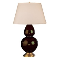 Chocolate glazed ceramic finish. Three way switch. Antique natural brass finished accents. Pearl Dupioni fabric shade.