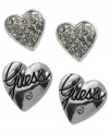 Embrace your love to mix and match. This darling duo set from GUESS features two pair of heart-shaped studs -- one with a jet epoxy logo, the other with shiny pave stones. Crafted in silver tone mixed metal. Approximate diameter: 1 inch.