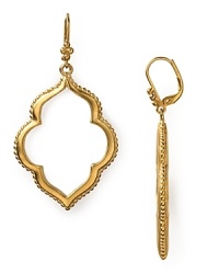 Statement earrings are a strong trend this season. This gold-tone pair from T Tahari captures the look with textured detailing and a shapely, paisley design.