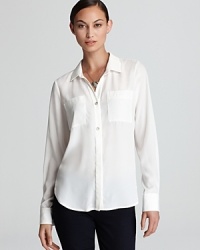 An essential Isaac Mizrahi Jeans shirt gets a contemporary reboot with sheer styling and relaxed tailoring.