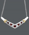 Shapely design with a bold touch of color. This v-shaped necklace features alternating, round-cut rubies (3/8 ct. t.w.) and white sapphires (3/8 ct. t.w.) in a polished sterling silver setting with 14k gold accents. Approximate length: 18 inches. Approximate drop: 1-1/2 inches.
