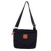 Waterproof treatment given to bag for more durability. Features leather trim and zip top closure. Outside zipper pocket.