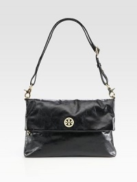 A soft leather messenger inspired style with goldtone hardware and signature logo.Detachable adjustable shoulder strap, 9½-20 dropMagnetic snap top closureOne inside zip pocketTwo inside open pocketsCotton lining12½W X 9H X 1½DImported A soft leather messenger inspired style with goldtone hardware and signature logo.Detachable adjustable shoulder strap, 9½-20 dropMagnetic snap top closureOne inside zip pocketTwo inside open pocketsCotton lining12½W X 9H X 1½DImported
