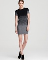 This Cut25 pullover sweater dress boasts a unique ombre pattern on a body-con silhouette for cozy chic.