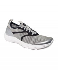 Sleek and silver. Easy Spirt's Reinvent sneakers feature an eye-catching honeycomb design and an easy-to-walk-in flex sole. Sleek and silver. Easy Spirt's Reinvent sneakers feature an eye-catching honeycomb design and an easy-to-walk-in flex sole.