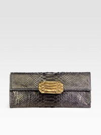 Lustrous python-embossed rubber in a sleek envelope shape.Magnetic flap closureOne inside zip pocketFully lined11¾W X 5¼H X 1½DMade in the USA Lustrous python-embossed rubber in a sleek envelope shape.Magnetic flap closureOne inside zip pocketFully lined11¾W X 5¼H X 1½DMade in the USA