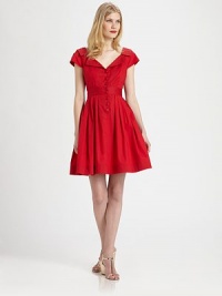 Flirty retro-chic in a full-skirted frock styled with a nipped waist and skin-baring back cutout.V necklineModified notch collarCap sleevesBust dartsButton-down frontPleated skirtBack V with button closureAbout 21 from natural waist98% cotton/2% spandexDry cleanMade in USA of imported fabricModel shown is 5'10 (177cm) wearing US size 4. Flirty retro-chic in a full-skirted frock styled with a nipped waist and skin-baring back cutout.V necklineModified notch collarCap sleevesBust dartsButton-down frontPleated skirtBack V with button closureAbout 21 from natural waist98% cotton/2% spandexDry cleanMade in USA of imported fabricModel shown is 5'10 (177cm) wearing US size 4.