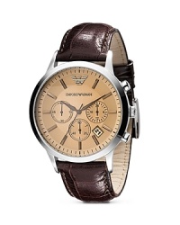 This Emporio Armani piece works hard with a versatile style that goes on-and-off the clock, crafted of a stainless steel case with an embossed leather strap as a classic counterpart. This Emporio Armani piece works hard with a versatile style that goes on-and-off the clock, crafted of a stainless steel case with an embossed leather strap as a classic counterpart.