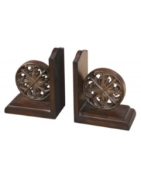 Keep your wheels turning. Chakra bookends by Uttermost feature a distressed chestnut-brown finish and tan glaze to organize your personal library with rustic sophistication. Keep your wheels turning. Chakra bookends by Uttermost feature a distressed chestnut-brown finish and tan glaze to organize your personal library with rustic sophistication.