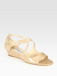 From the 24:7 Collection. Patent leather wedge with adjustable, curvy straps adds the perfect finishing touch to any outfit. Self-covered wedge, 1½ (40mm)Patent leather upperLeather lining and solePadded insoleMade in Italy From the 24:7 Collection. Patent leather wedge with adjustable, curvy straps adds the perfect finishing touch to any outfit. Self-covered wedge, 1½ (40mm)Patent leather upperLeather lining and solePadded insoleMade in Italy
