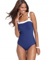 Only at Macy's, square hardware buckles add a splash of style to this Magicsuit one-piece swimsuit -- tummy control ensures a sleek seaside look!